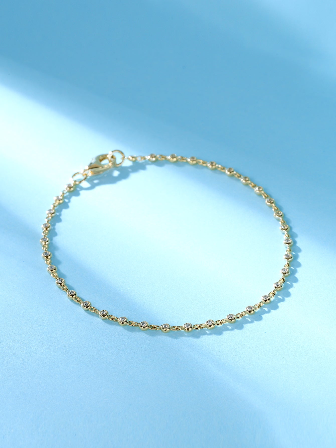 Diamond by the yard necklace, Bezel set with small diamonds